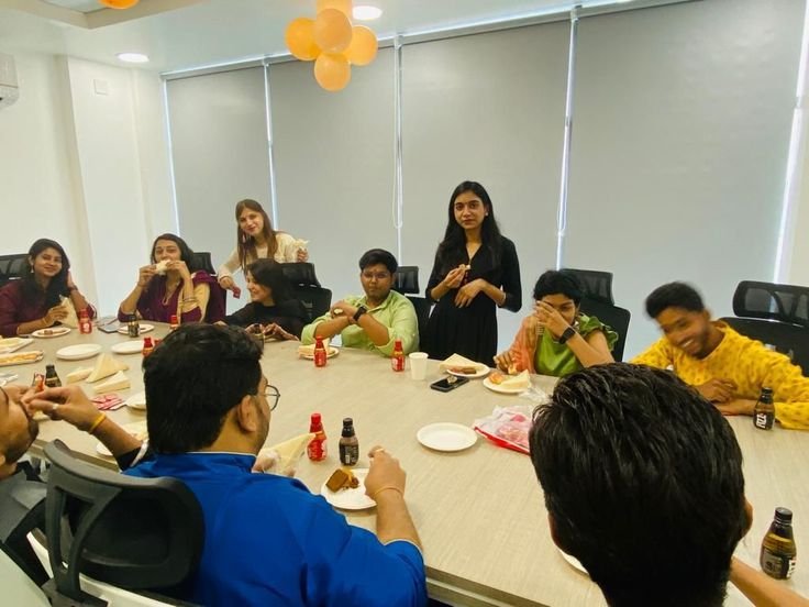 Employees participating in indoor team building games, Air Hockey, puzzles, quizzes, arcade entertainment and interactive activities at a corporate event in Delhi.