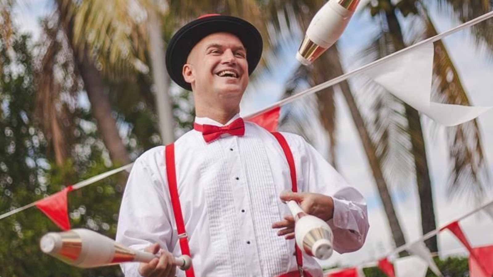 Vintage Theme Party Ideas with Vintage Circus Juggler in Race Course