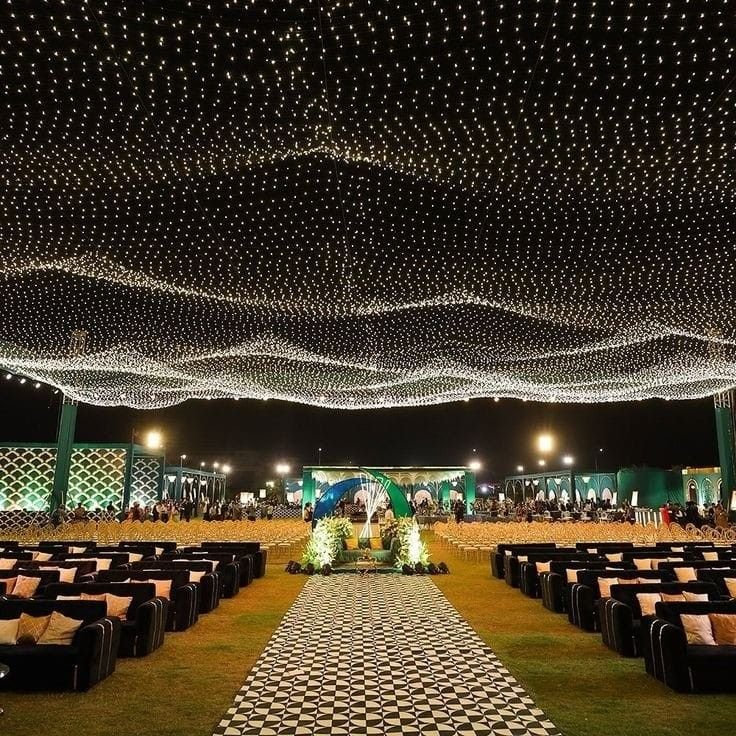 Beautiful first birthday party setup with balloon decorations, themed backdrop, birthday cake, and kids' entertainment in Delhi NCR.